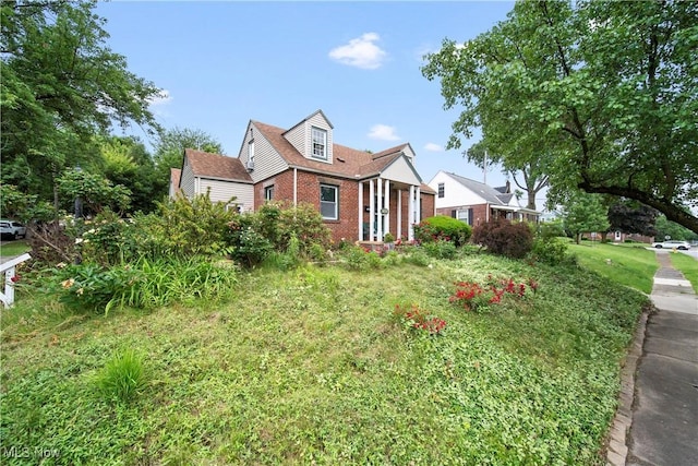1499 Redwood Ave, Akron, OH 44301 - view of front of home featuring brick siding