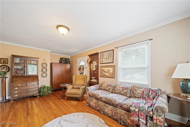 1499 Redwood Ave, Akron, OH 44301 - living area featuring wood finished floors and ornamental molding