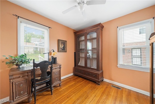 1499 Redwood Ave, Akron, OH 44301 - office area featuring a ceiling fan and light wood finished floors