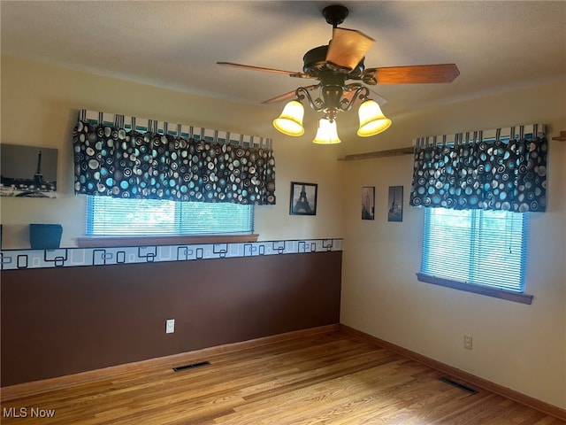 108 Janet Rd, Marietta, OH 45750 - spare room with a ceiling fan, plenty of natural light, and wood finished floors