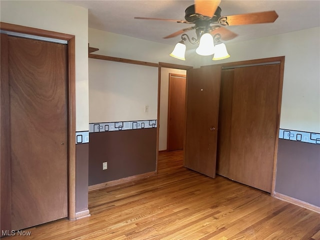 108 Janet Rd, Marietta, OH 45750 - unfurnished bedroom with light wood-style flooring and ceiling fan