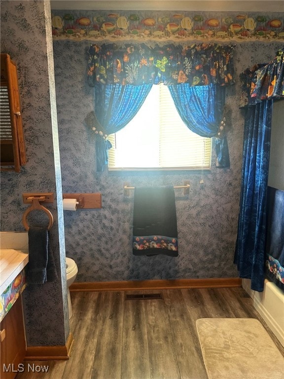 108 Janet Rd, Marietta, OH 45750 - full bath with wood finished floors, vanity, and wallpapered walls