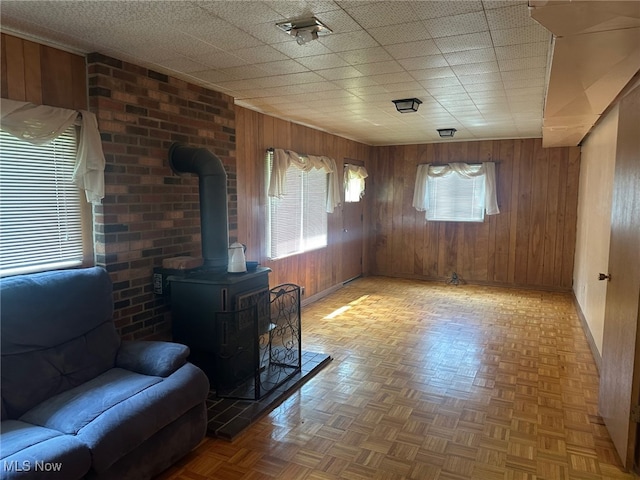 108 Janet Rd, Marietta, OH 45750 - living area featuring a wood stove and wood walls