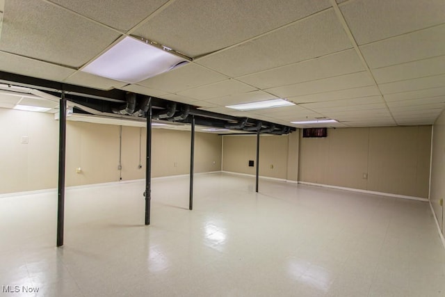 449 Westchester Dr SE, Warren, OH 44484 - finished basement featuring a drop ceiling and baseboards