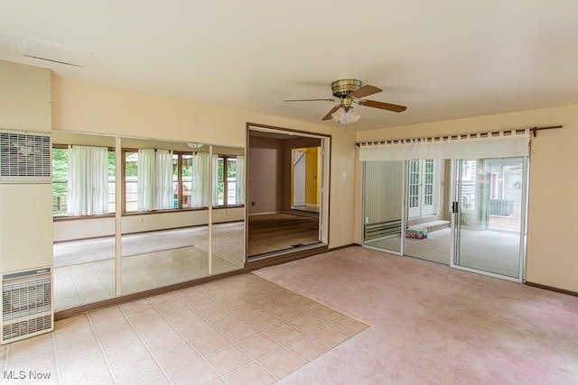 449 Westchester Dr SE, Warren, OH 44484 - unfurnished sunroom featuring a heating unit and french doors