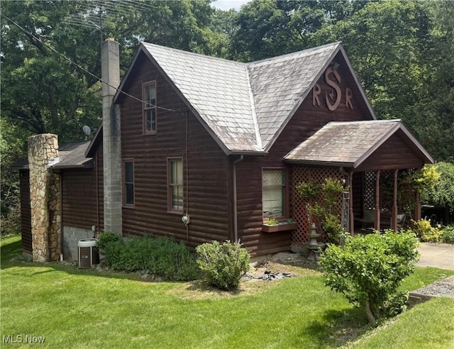 19693 Dudley Rd, Caldwell, OH 43724 - view of front of property with a chimney and a front lawn