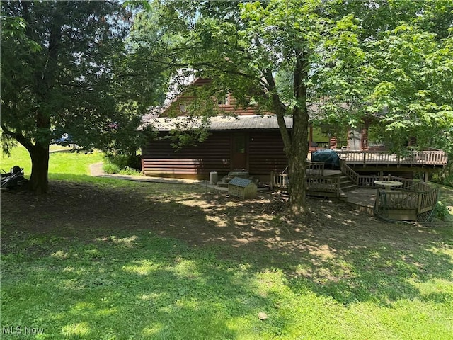 19693 Dudley Rd, Caldwell, OH 43724 - view of green lawn featuring a deck