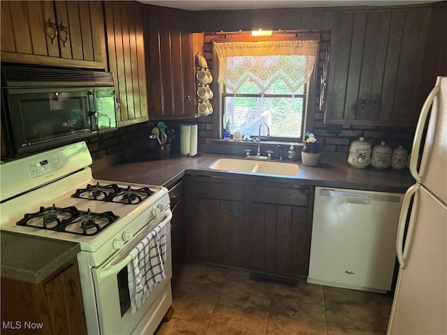 19693 Dudley Rd, Caldwell, OH 43724 - kitchen with white appliances, decorative backsplash, and dark countertops