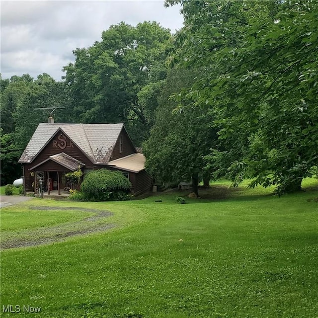 19693 Dudley Rd, Caldwell, OH 43724 - view of green lawn with driveway
