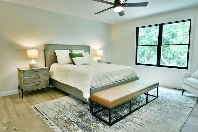 2320 Wilshire Dr, Cortland, OH 44410 - bedroom with light wood-style floors and a ceiling fan