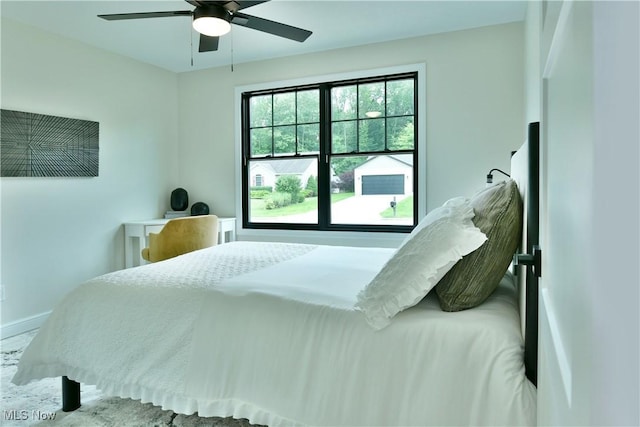 2320 Wilshire Dr, Cortland, OH 44410 - bedroom with baseboards and a ceiling fan