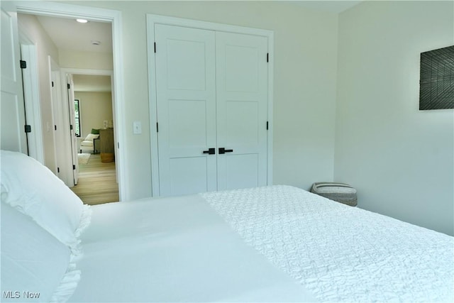 2320 Wilshire Dr, Cortland, OH 44410 - bedroom featuring a closet and wood finished floors