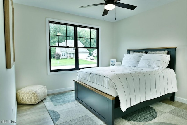 2320 Wilshire Dr, Cortland, OH 44410 - bedroom featuring wood finished floors and ceiling fan
