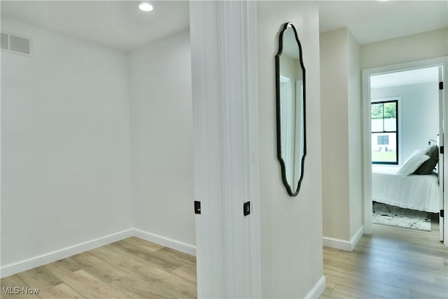 2320 Wilshire Dr, Cortland, OH 44410 - laundry area featuring light wood-style flooring and recessed lighting