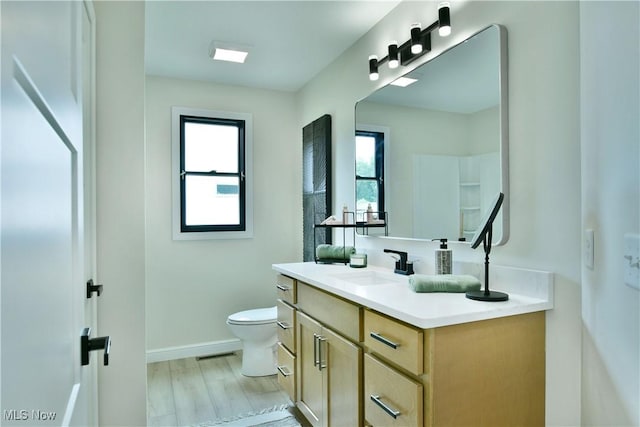 2320 Wilshire Dr, Cortland, OH 44410 - bathroom with vanity and wood finished floors