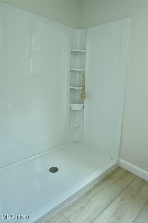 2320 Wilshire Dr, Cortland, OH 44410 - bathroom with wood finished floors and a shower