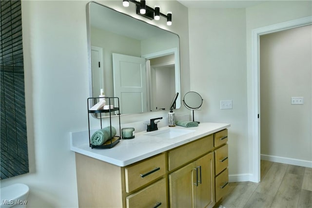 2320 Wilshire Dr, Cortland, OH 44410 - bathroom with vanity and wood finished floors