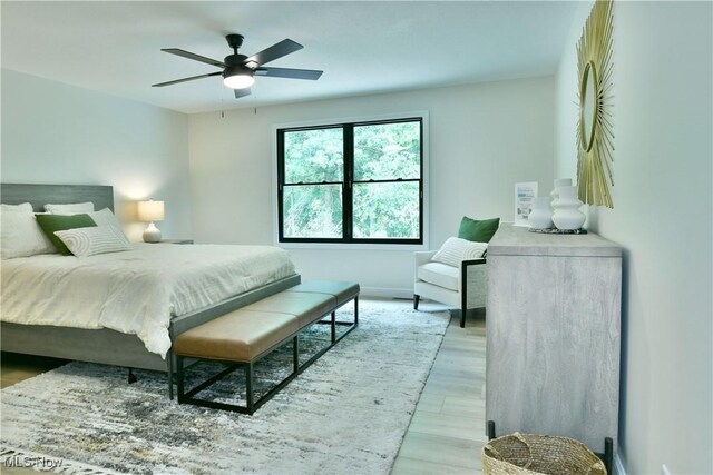 2320 Wilshire Dr, Cortland, OH 44410 - bedroom with light wood finished floors and a ceiling fan