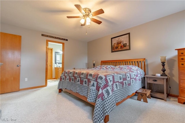 10393 Scotney Ave NW, North Canton, OH 44720 - bedroom with carpet, ceiling fan, and ensuite bath