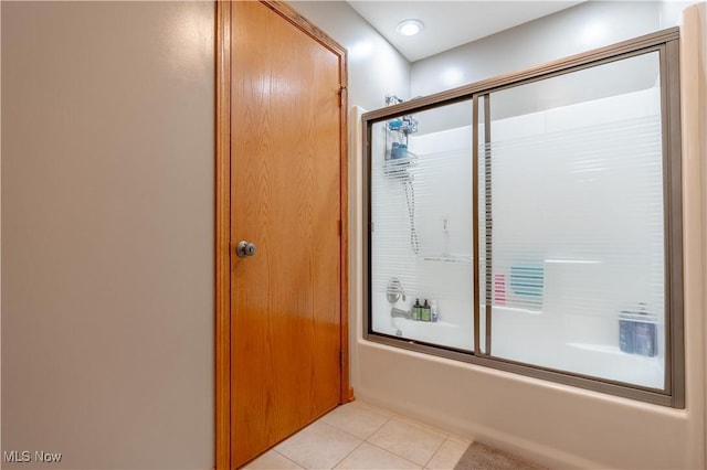 10393 Scotney Ave NW, North Canton, OH 44720 - full bath featuring tile patterned flooring and enclosed tub / shower combo