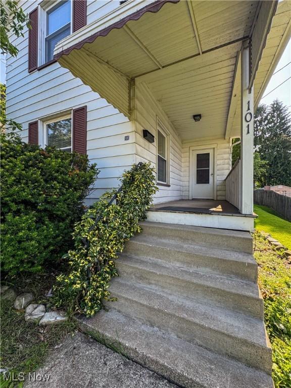 101 Ridgeway St, Struthers, OH 44471 - property entrance featuring covered porch