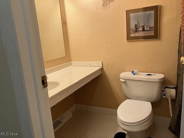 625 Canterbury Ln Unit 27A, Medina, OH 44256 - half bathroom with tile patterned floors