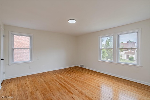 3886 Faversham Rd, University Heights, OH 44118 - spare room with light wood finished floors and baseboards