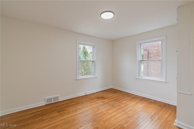 3886 Faversham Rd, University Heights, OH 44118 - empty room with light wood-type flooring and baseboards