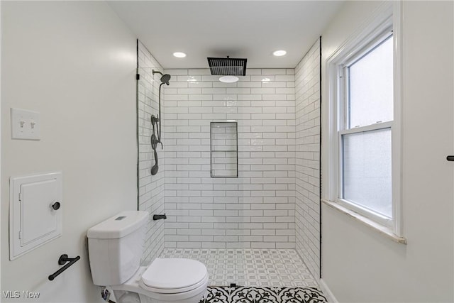 3886 Faversham Rd, University Heights, OH 44118 - full bath featuring a tile shower and recessed lighting