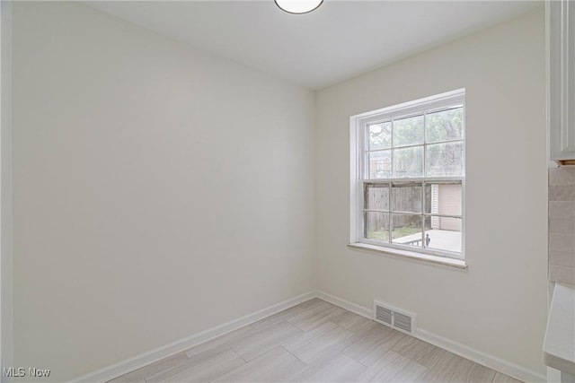 3886 Faversham Rd, University Heights, OH 44118 - empty room with baseboards
