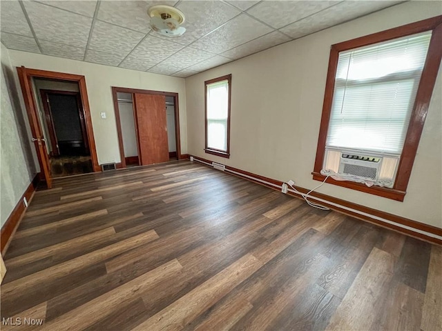 1874 Idaho Ave, East Liverpool, OH 43920 - unfurnished bedroom featuring cooling unit, dark wood-style floors, and a closet