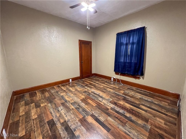 1874 Idaho Ave, East Liverpool, OH 43920 - empty room with dark wood-style flooring and a ceiling fan