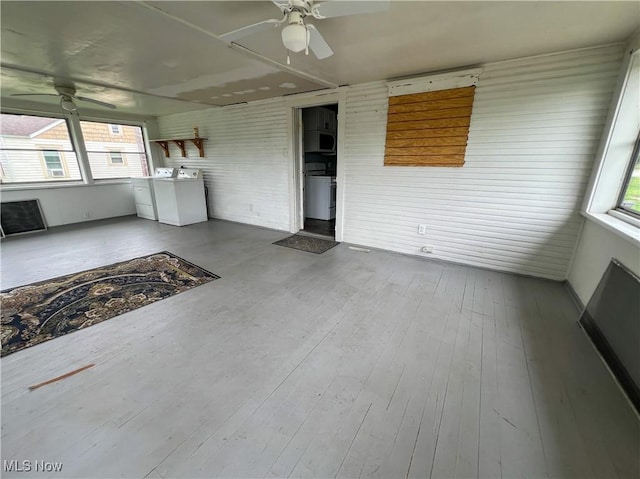 1874 Idaho Ave, East Liverpool, OH 43920 - unfurnished sunroom featuring plenty of natural light and washer and dryer