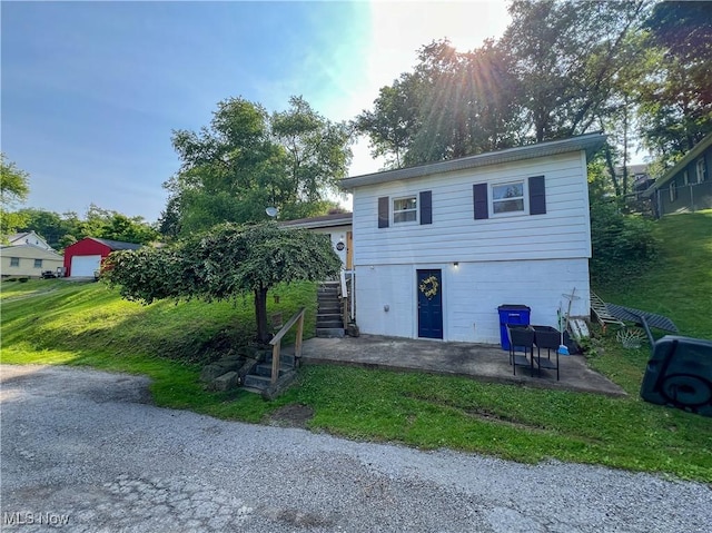 1714 Allison St, East Liverpool, OH 43920 - back of house with a patio and stairway
