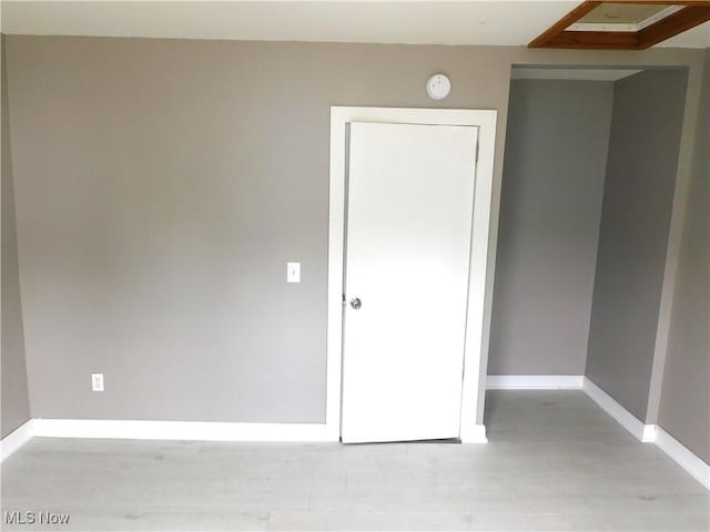 462 Monroe St, Conneaut, OH 44030 - unfurnished bedroom with baseboards and wood finished floors