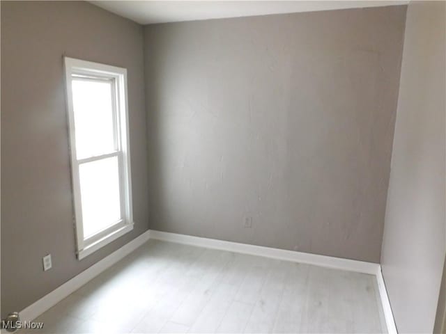 462 Monroe St, Conneaut, OH 44030 - unfurnished room featuring baseboards and light wood-style flooring