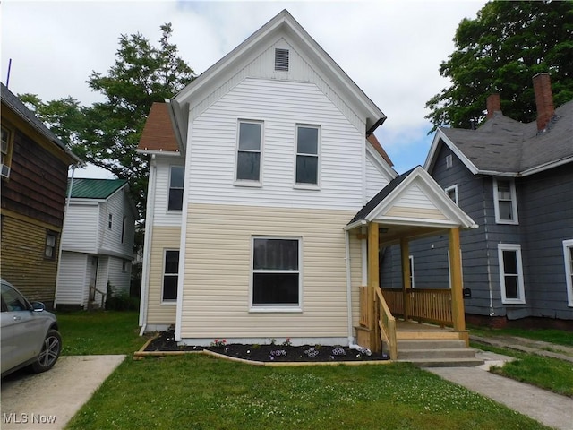 462 Monroe St, Conneaut, OH 44030 - view of front of property with a front yard and a porch