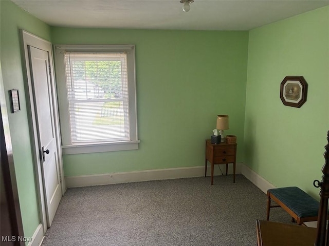 1051 Oakwood Ave NE, Massillon, OH 44646 - carpeted bedroom with baseboards
