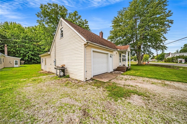 6136 Lake Rd W, Ashtabula, OH 44004 - garage featuring driveway