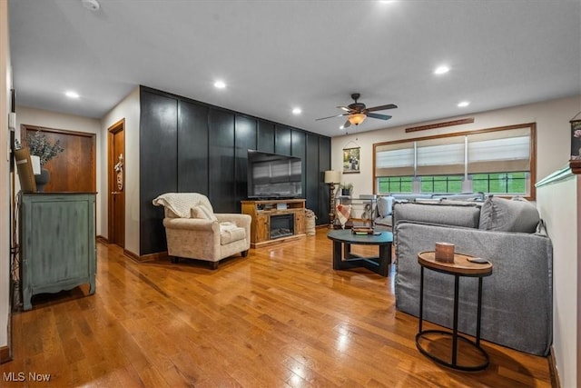 1448 Locust Ridge Rd, Washington, WV 26181 - living area featuring ceiling fan, light wood finished floors, recessed lighting, and a fireplace