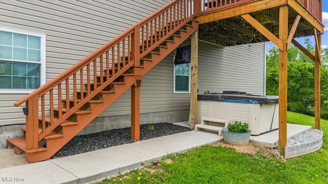 1448 Locust Ridge Rd, Washington, WV 26181 - view of patio featuring a hot tub, stairway, and a wooden deck
