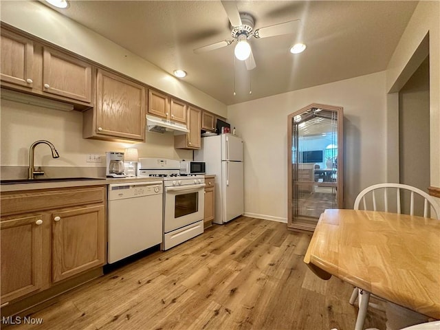 203 Willow Brook Dr NE, Warren, OH 44483 - kitchen with white appliances, under cabinet range hood, a ceiling fan, light wood-style flooring, and recessed lighting