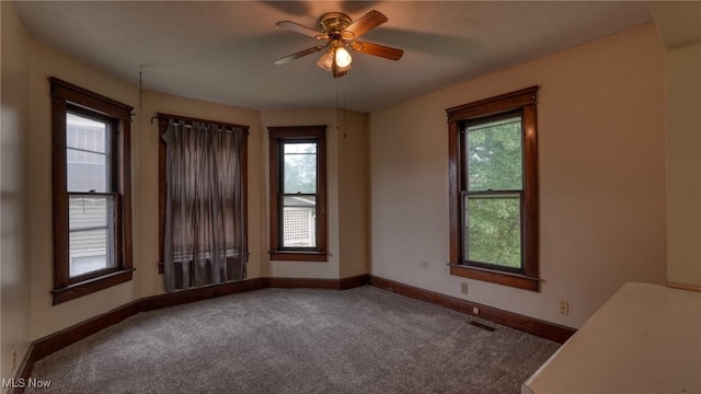 1515 Stewart Ave, Cambridge, OH 43725 - carpeted empty room with baseboards and ceiling fan