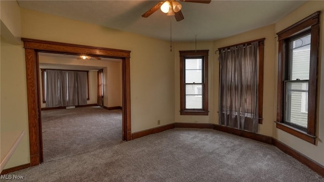 1515 Stewart Ave, Cambridge, OH 43725 - carpeted spare room featuring a ceiling fan and baseboards