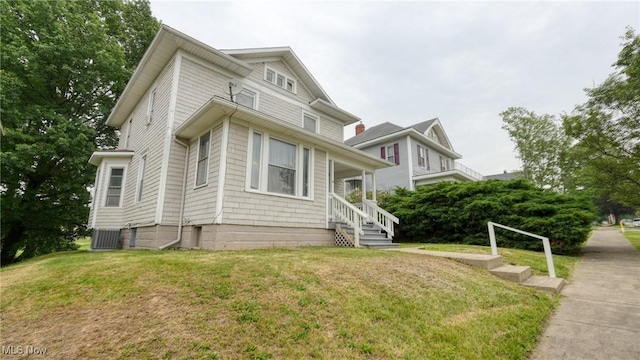 1515 Stewart Ave, Cambridge, OH 43725 - view of front of property with a front lawn