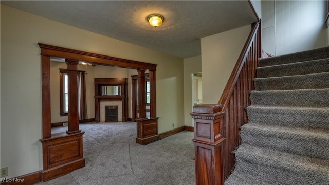 1515 Stewart Ave, Cambridge, OH 43725 - stairs featuring carpet and a fireplace