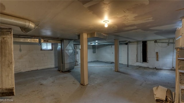 1515 Stewart Ave, Cambridge, OH 43725 - unfinished basement featuring heating unit and electric panel