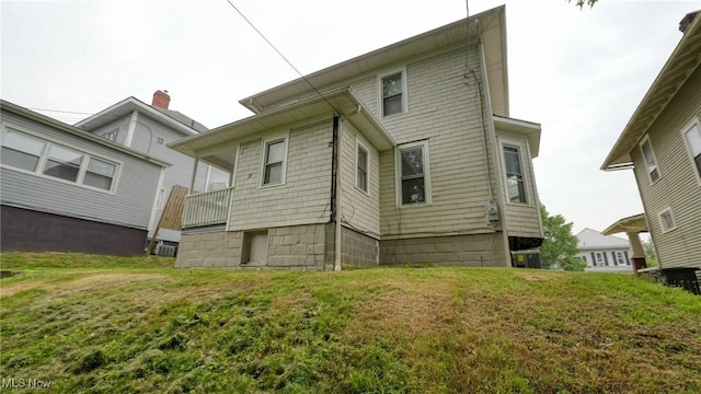 1515 Stewart Ave, Cambridge, OH 43725 - rear view of house with a lawn
