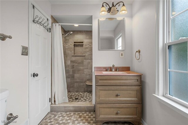 3846 Washington Blvd, University Heights, OH 44118 - bathroom featuring vanity and tiled shower