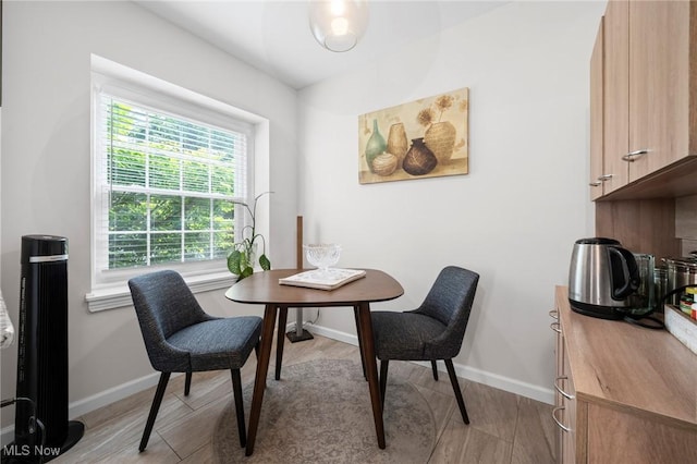 3846 Washington Blvd, University Heights, OH 44118 - dining room with baseboards and light wood-type flooring